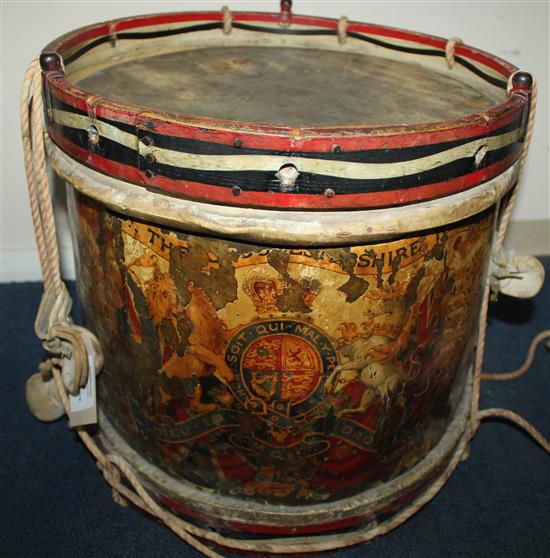 An early 20th century military brass drum for the Gloucestershire Regiment, 14.5in.